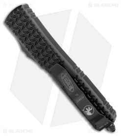 Microtech Ultratech D/E OTF Automatic Knife Tri-Grip Black (3.4" Red Full Serr) -Knife Shop Microtech Ultratech DE OTF Auto Tri Grip Black Red Full Serr BHQ 177336 jr side